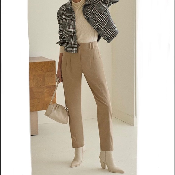 Straight-leg cream/tan coloured pants with extra button included. - Picture 1 of 5